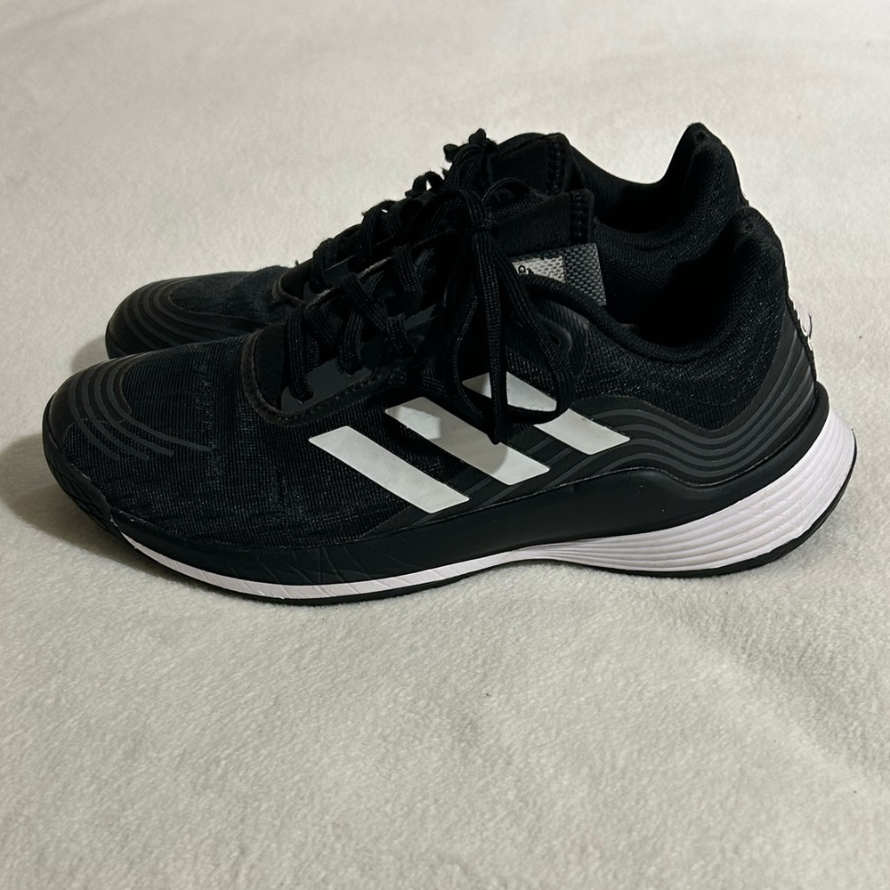 Adidas women’s size 7 black and white shoes.